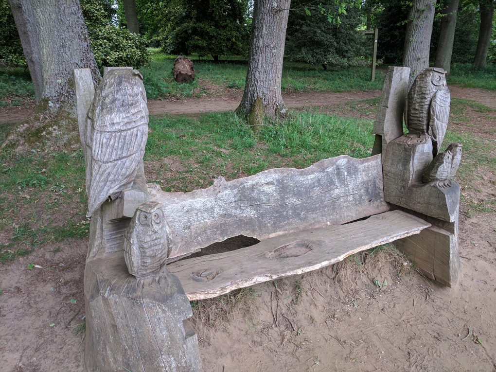 bench with carved owls