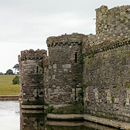 Beaumaris Castle and the surrounding moat.
