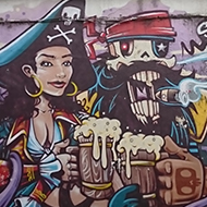 Very colourful street art depicting Captain Hook and his pirate mistress having a jar together. It makes a big splash on the side of an old pub called The Seven Stars, renown for having accommodated the Abolitionist Thomas Clerkson sometime in the 1800’s to further his research for the anti-slave trade campaign.