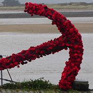 Anchor covered with hand knitted poppies