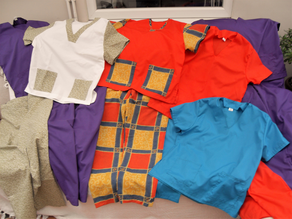 6 sets of hospital scrubs in different colours