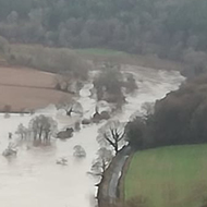 Flooded River with Bigsweir Bridge just holding on.