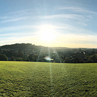 View of Bath bathed in sun light from Bathwick Hill.