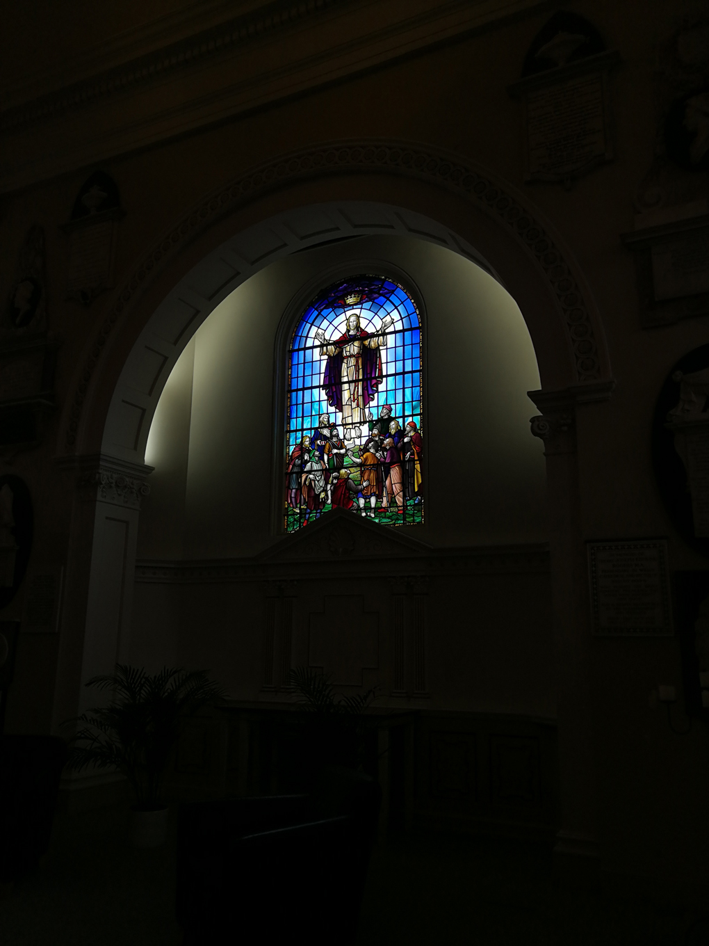 stained glass window with morning sunlight coming through
