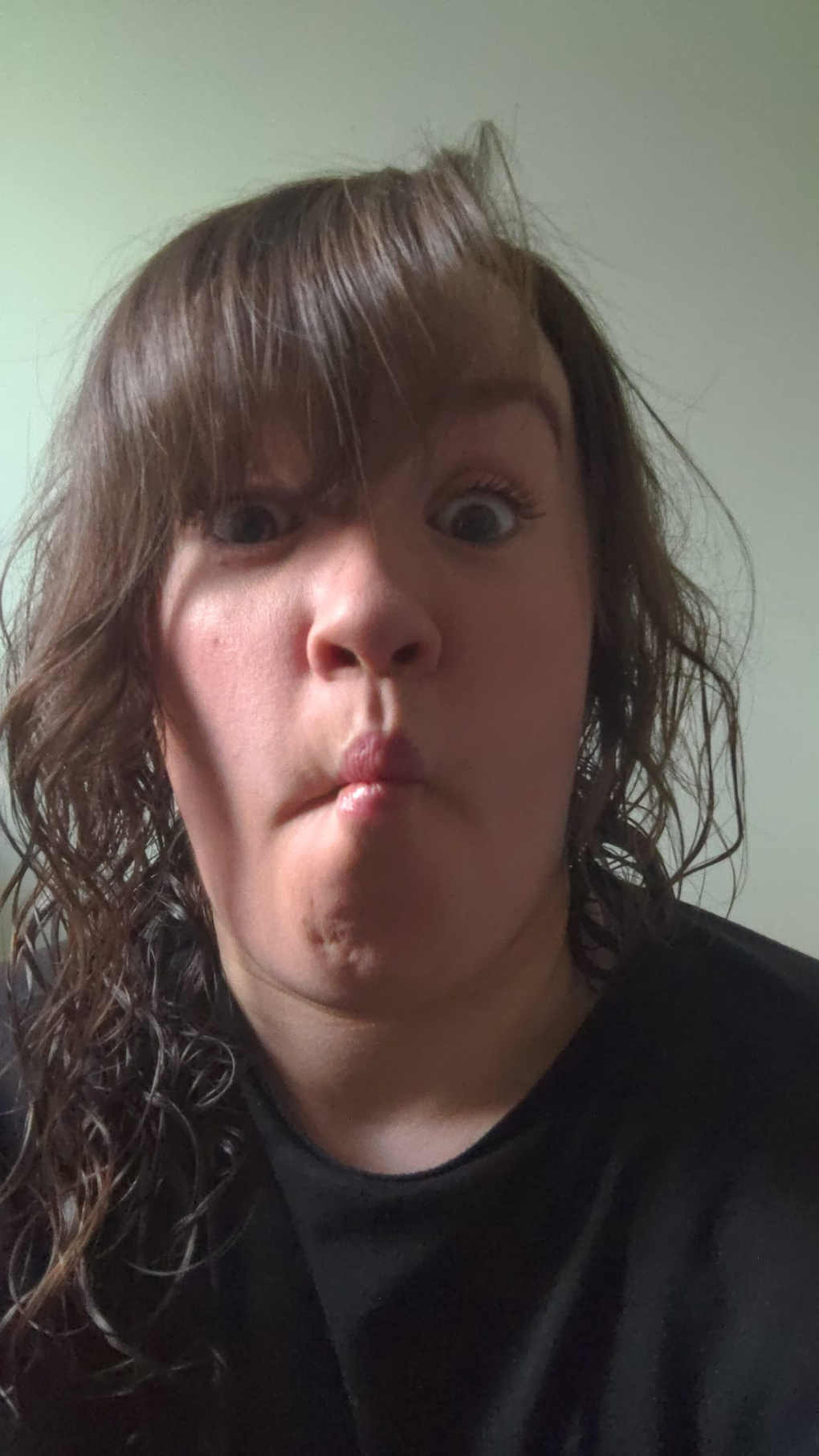 Anna pulling a face by sucking in her cheeks