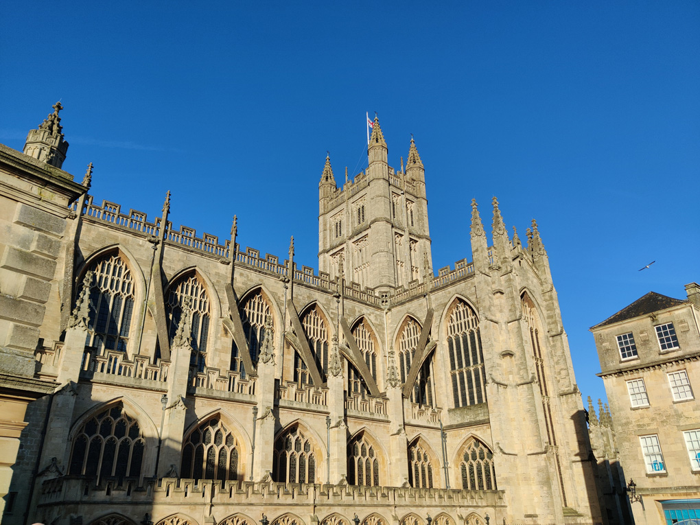 Looking up at Bath Abbey on a blue sky winter's day