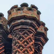 Ornate brick chimney stack.