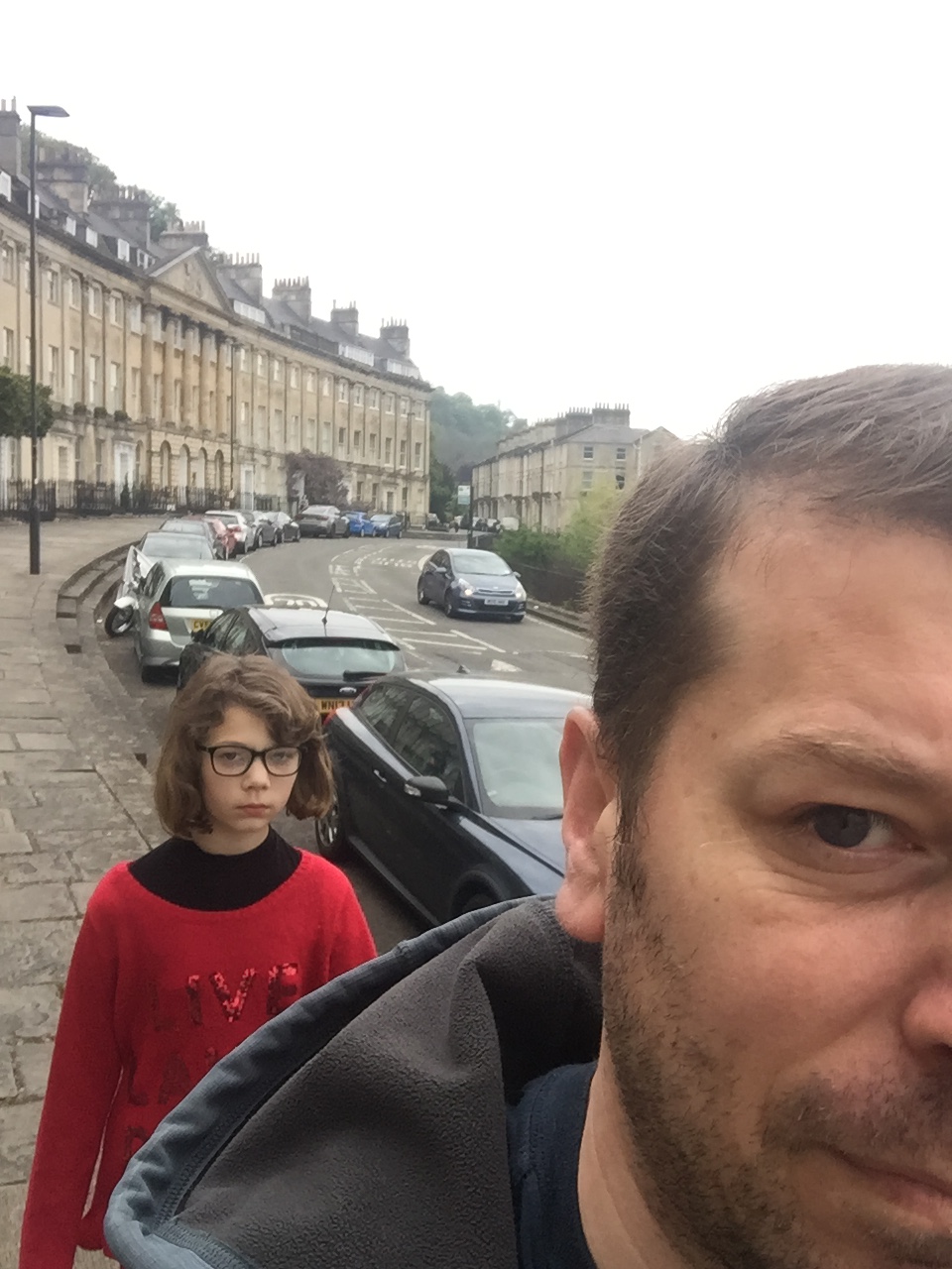 father and daughter in the street