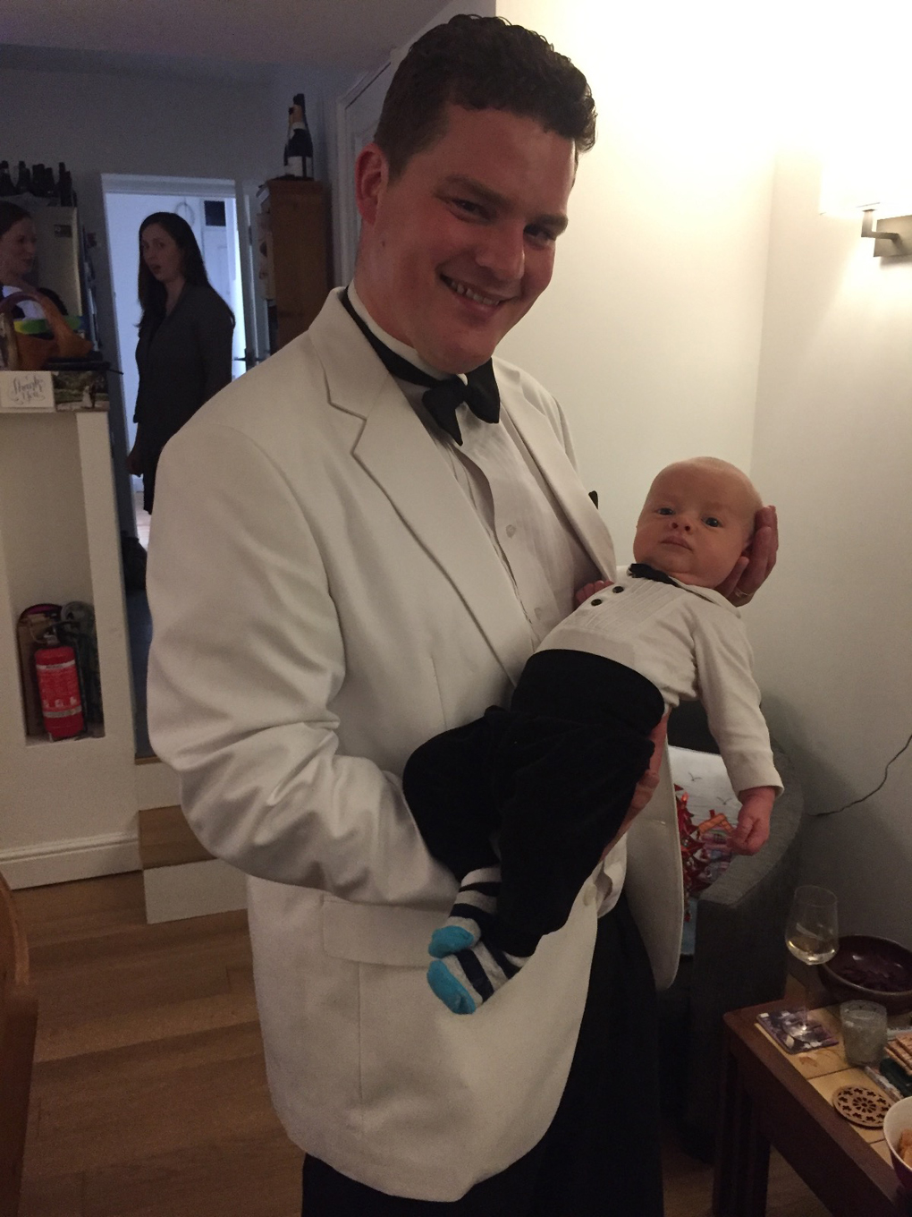 man and baby dressed the same