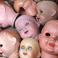 box of doll heads