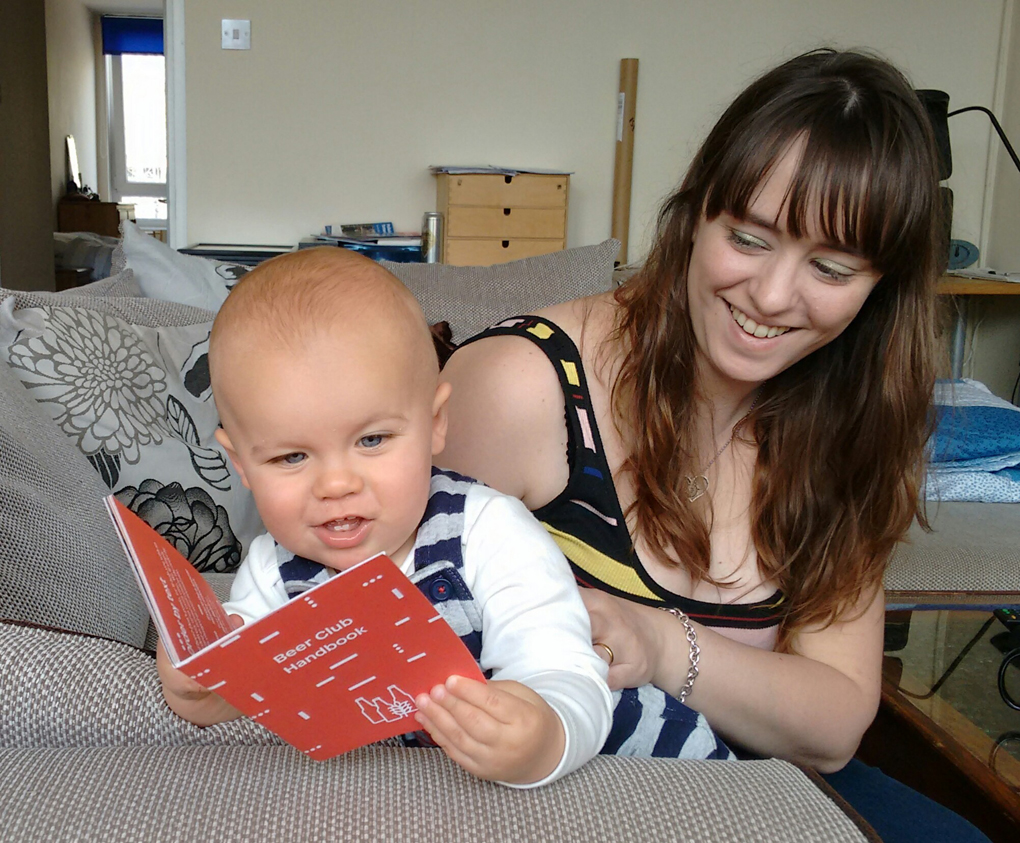 baby reading a book