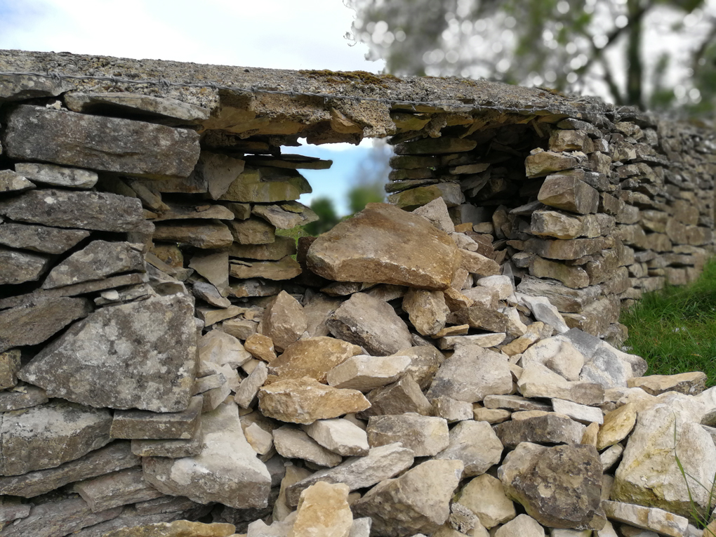 dry stone wall with a hole