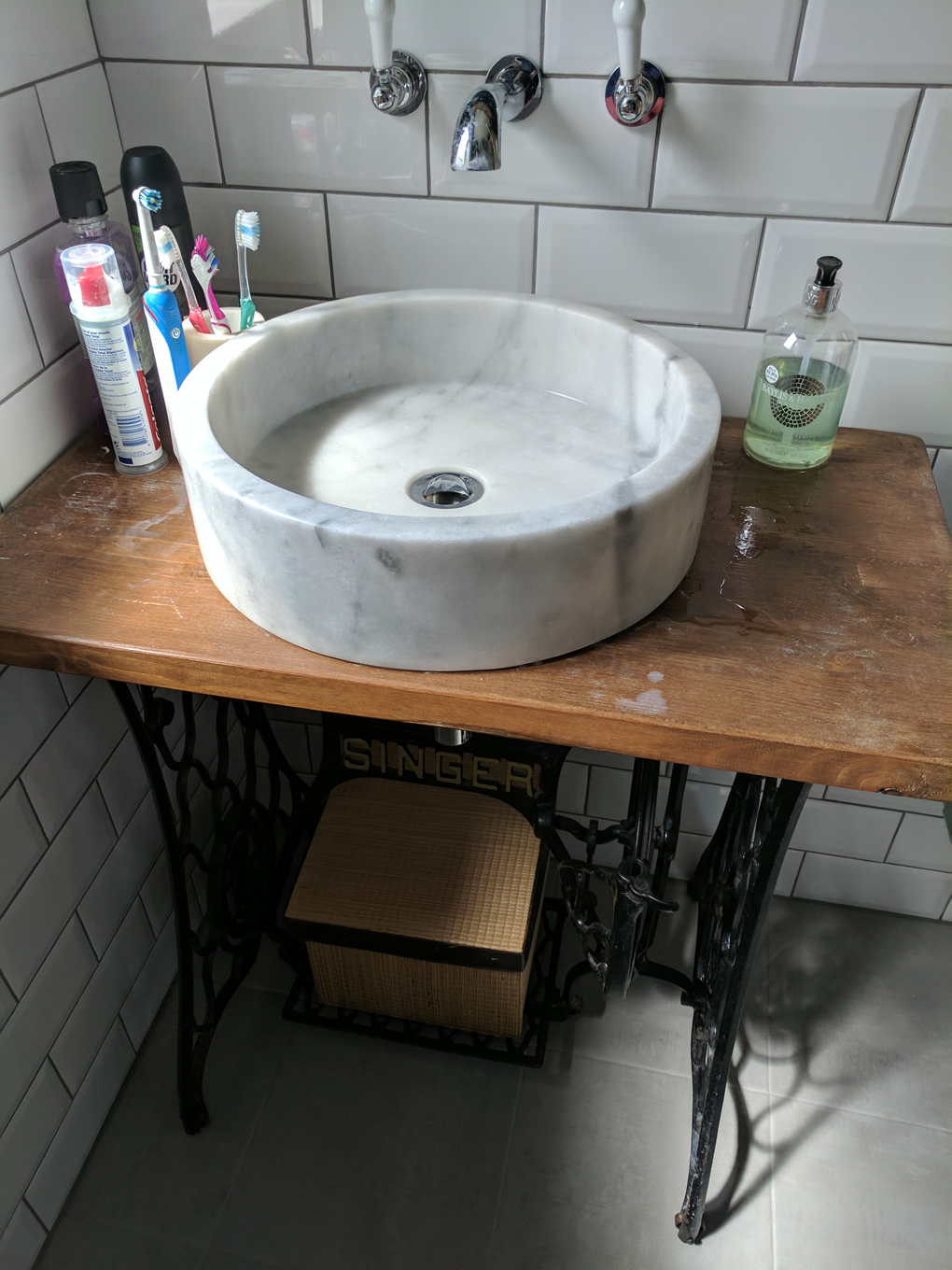 sewing machine turned into a sink