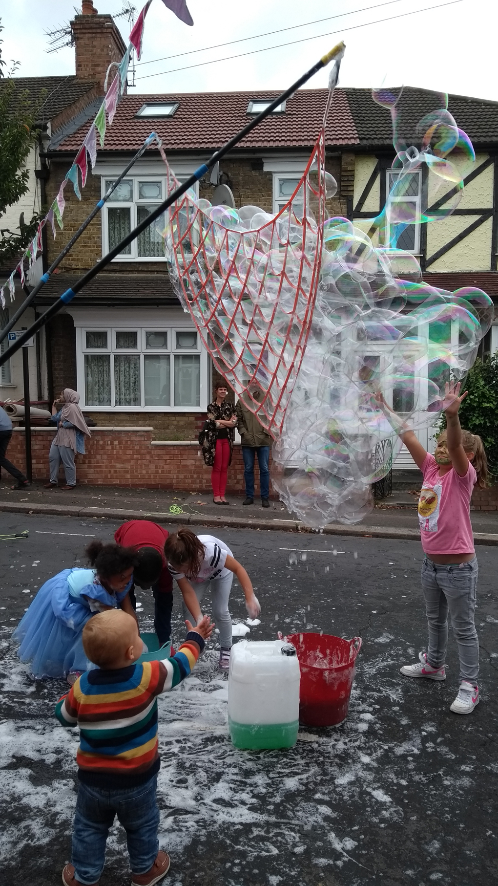 people playing with bubbles