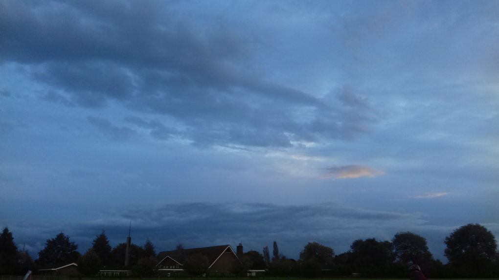 blue sky over houses