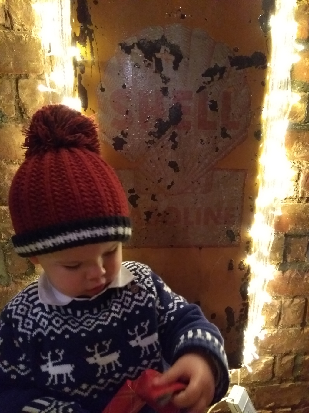 baby in a Christmas jumper
