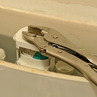 toilet being repaired