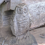 bench with carved owls