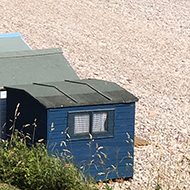 beach with huts