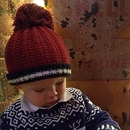 baby in a Christmas jumper