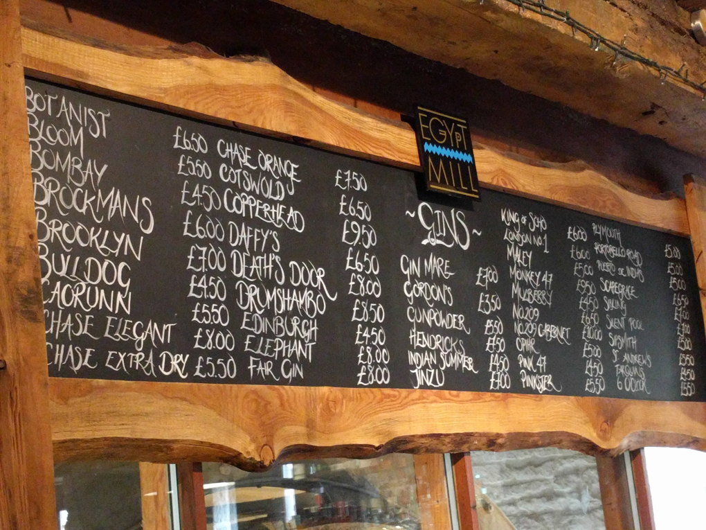 price list of gins in a pub
