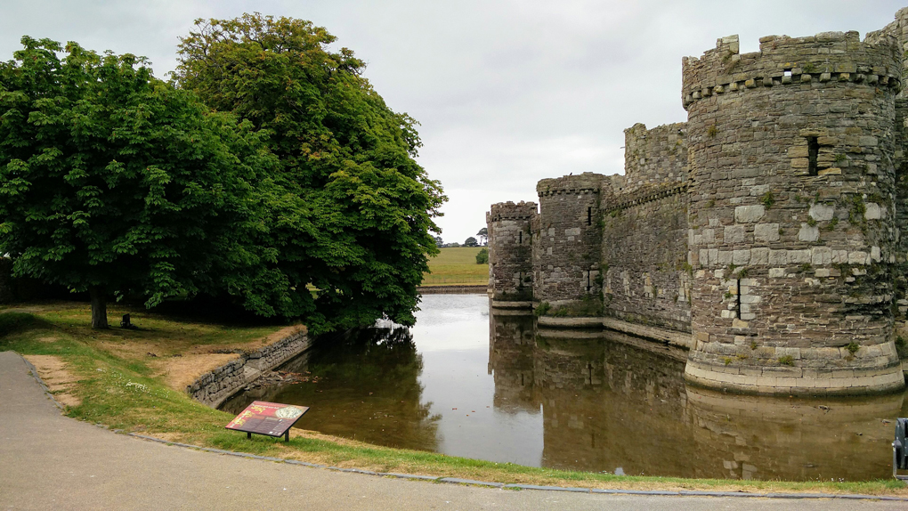 Beaumaris Castle and the surrounding moat.