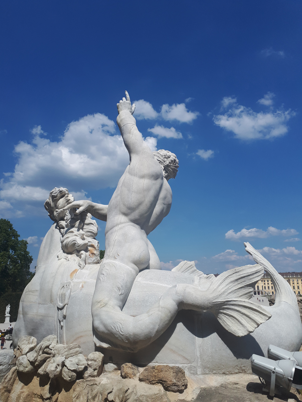 statue of a merman in an intimate position