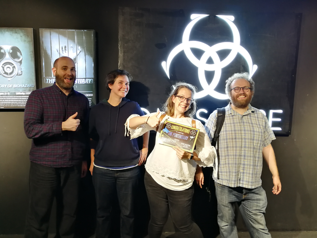 Tom, Lyns, Rhiannon and Gareth looking happy after completing the escape room