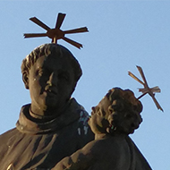 statue of a saint and baby