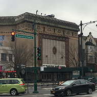 An old movie palace converted to a church on a grey day in Brooklyn