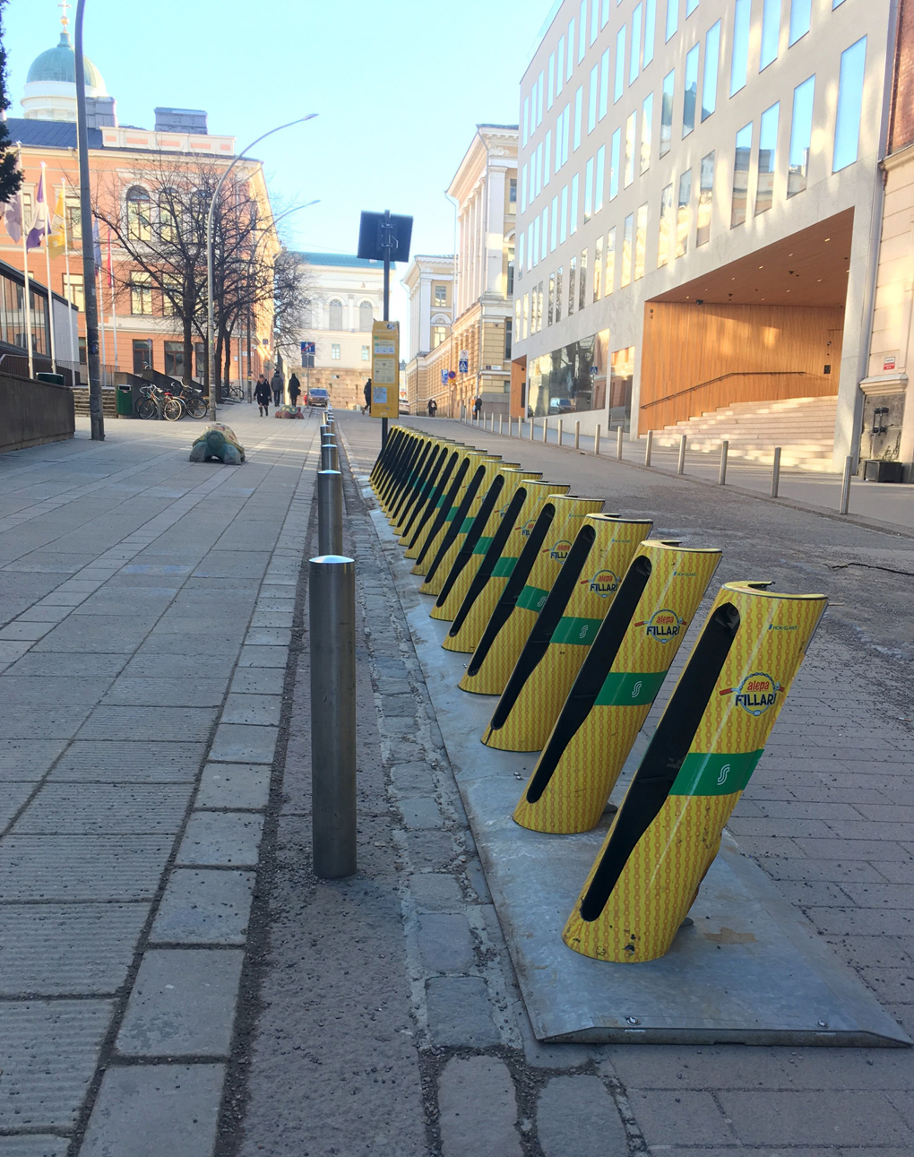 Yellow bike rack on a street