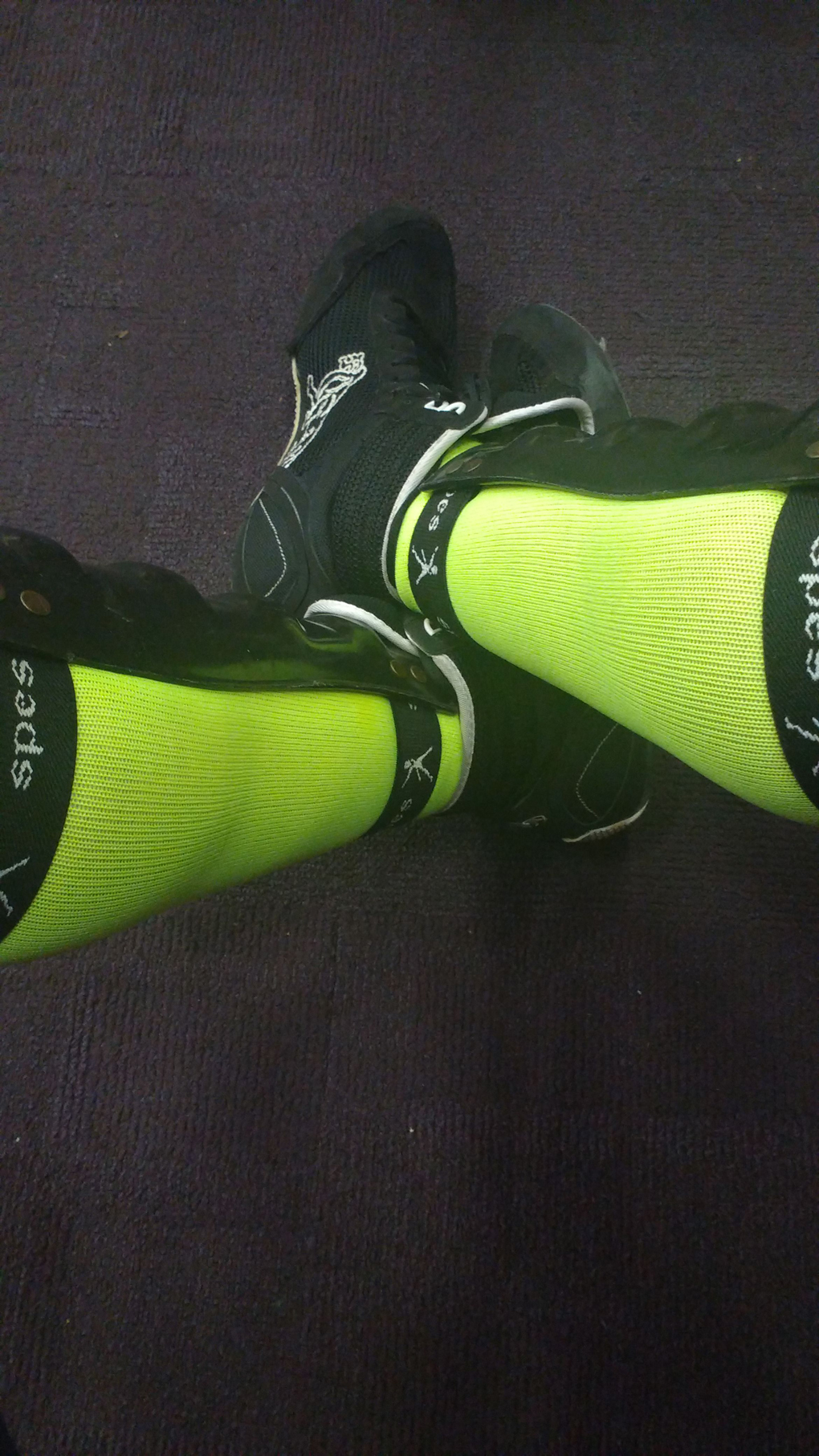 A pair of very florescent green/yellow socks