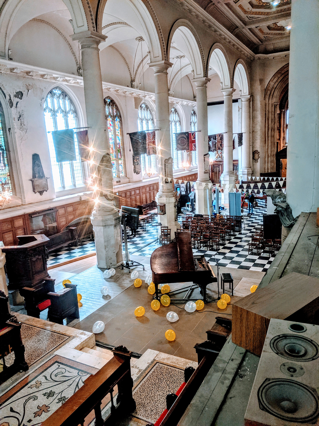 Piano and balloons in a church