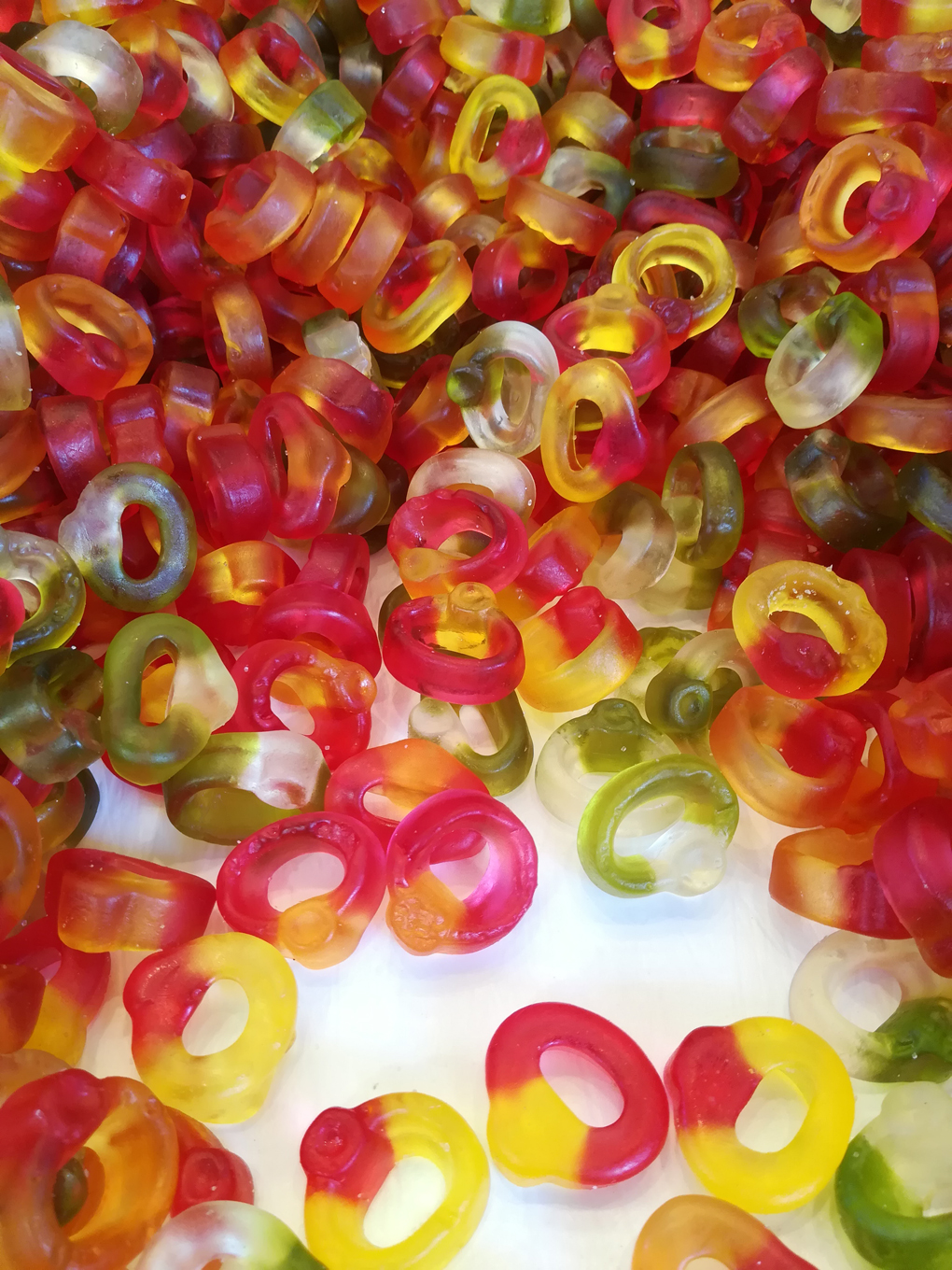 a photo of brightly coloured chewy ring sweets