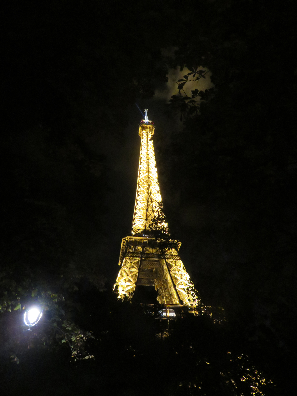 Eiffel tower lit up at night