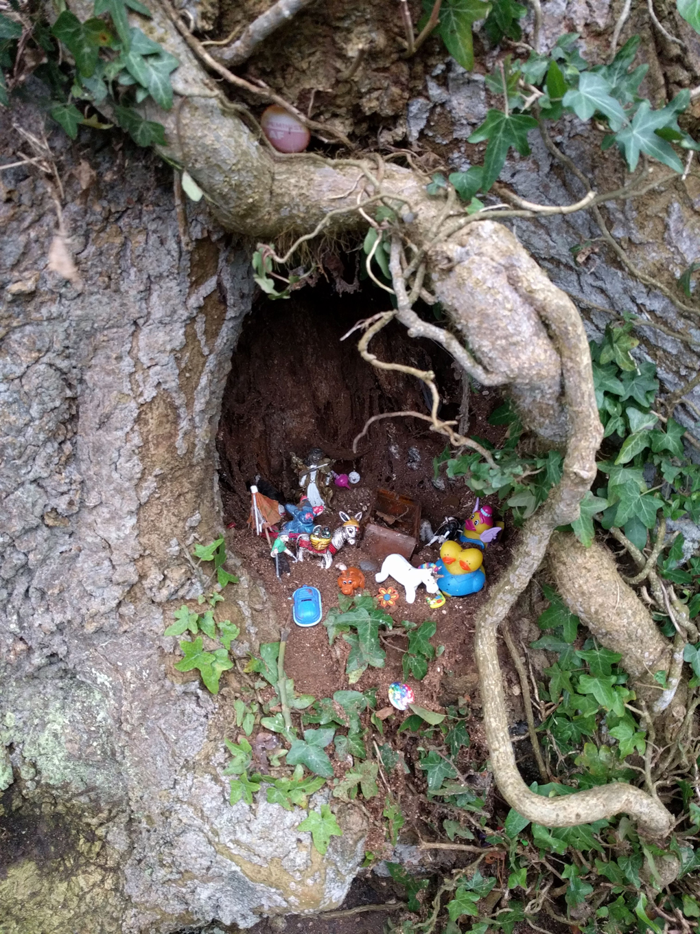 A fairy grotto in the base of a tree.