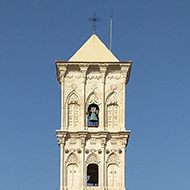 white church in a square in Cyprus