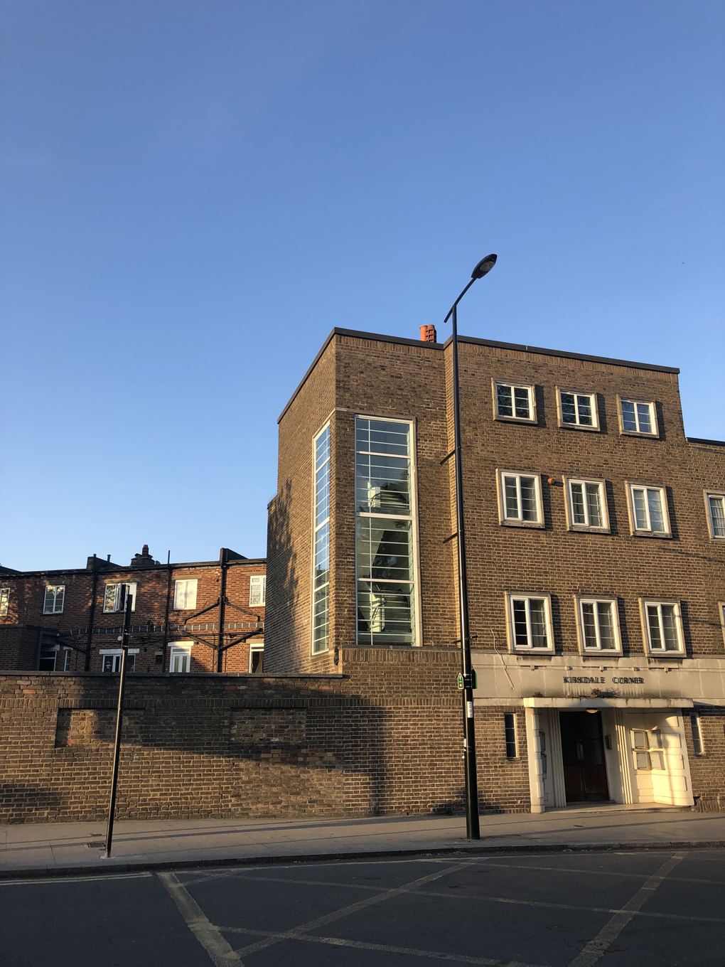 Image of Art Deco office building with blue skies in the background