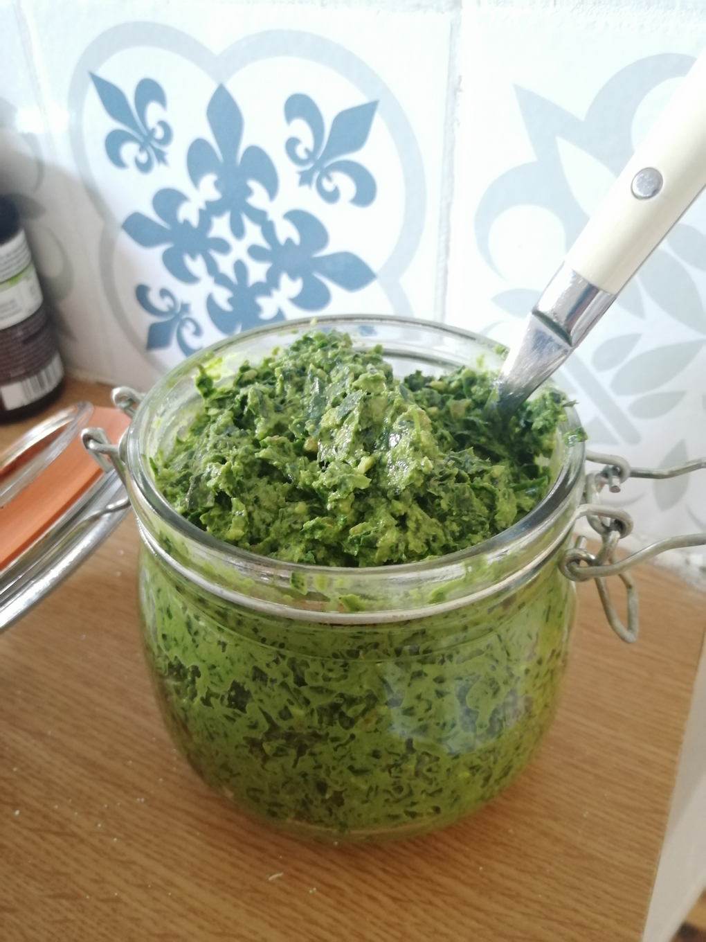 A jar of garlic pesto.