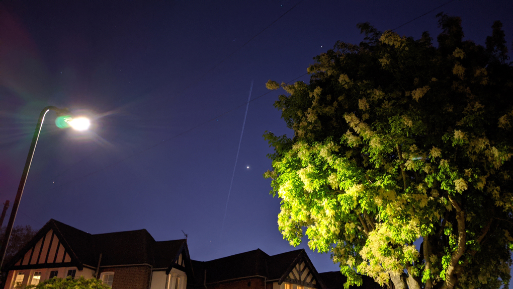 light in the night sky over London