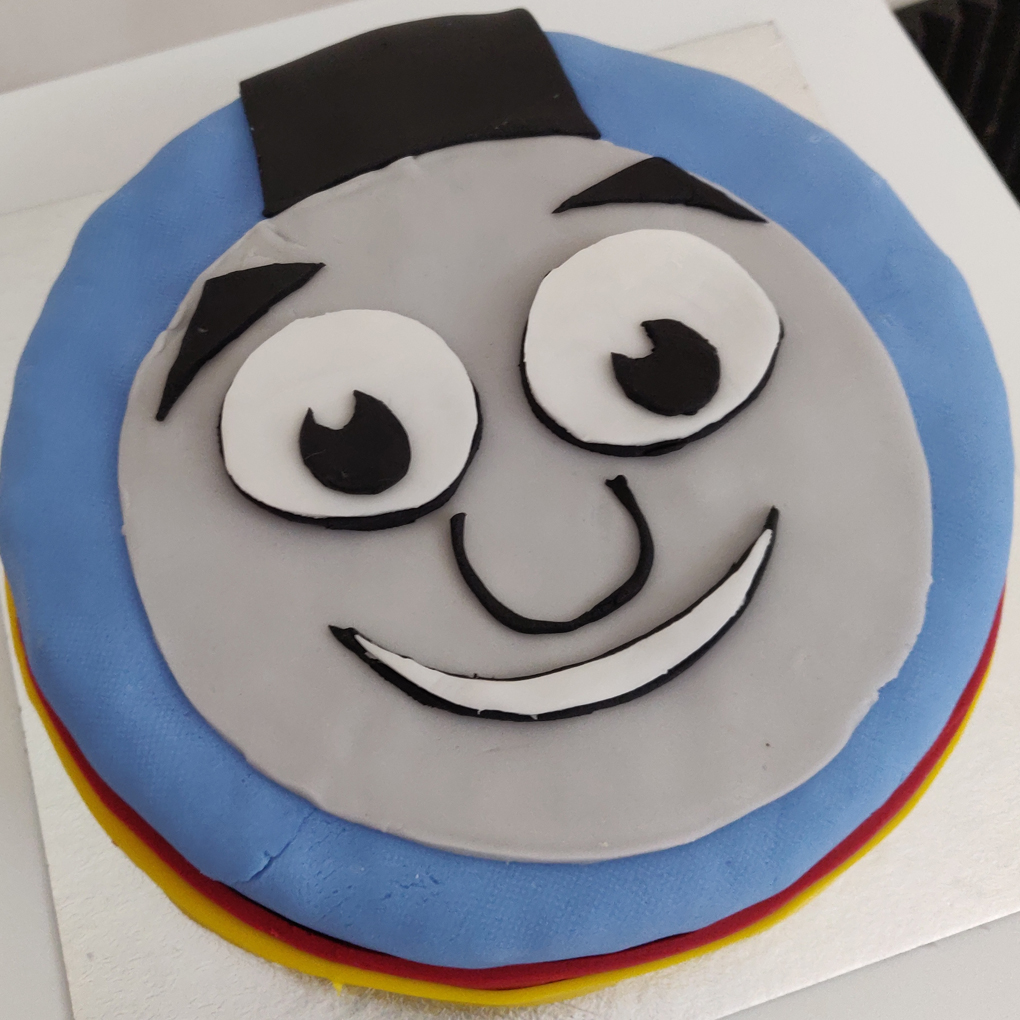 A home made Thomas the Tank engine birthday cake