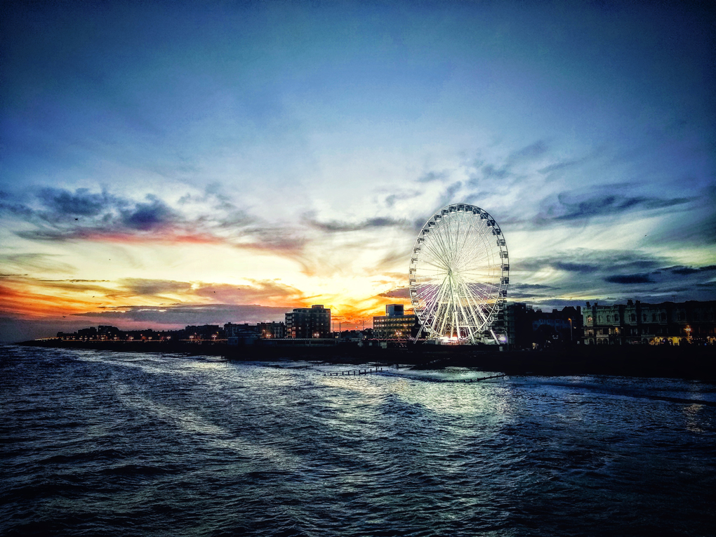 Sunset over Ferris wheel