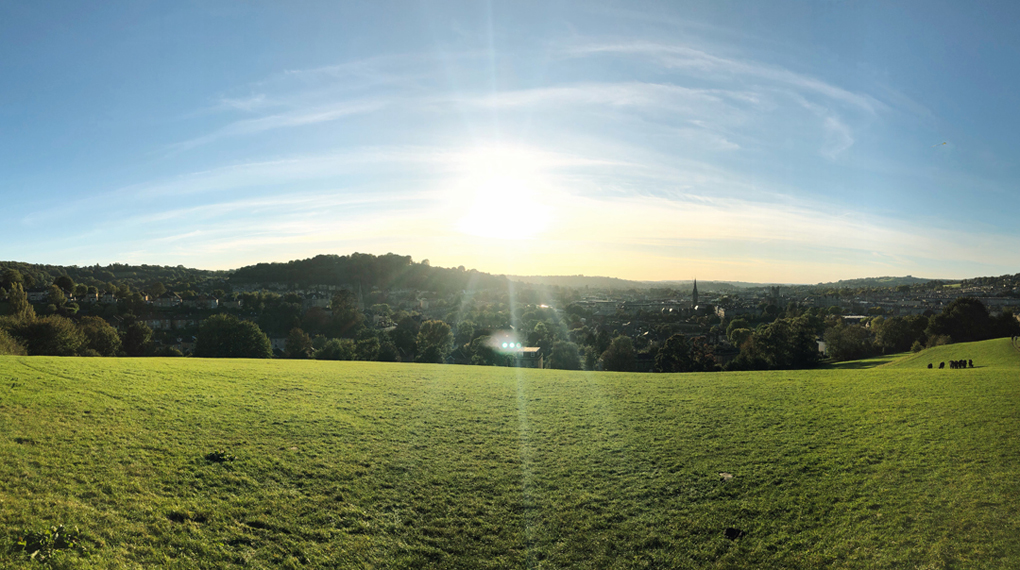 View of Bath bathed in sun light from Bathwick Hill.