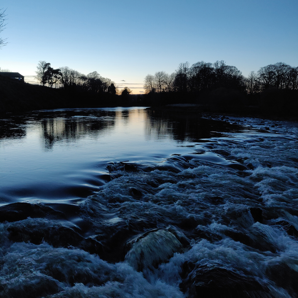 winter river at sunset