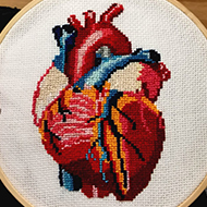 A stitched picture of a heart
