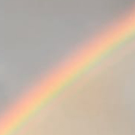 Double rainbow over Barbican exhibition and apartment buildings in central London