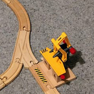 wooden trainset on carpet