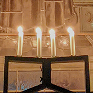 Candles in church window