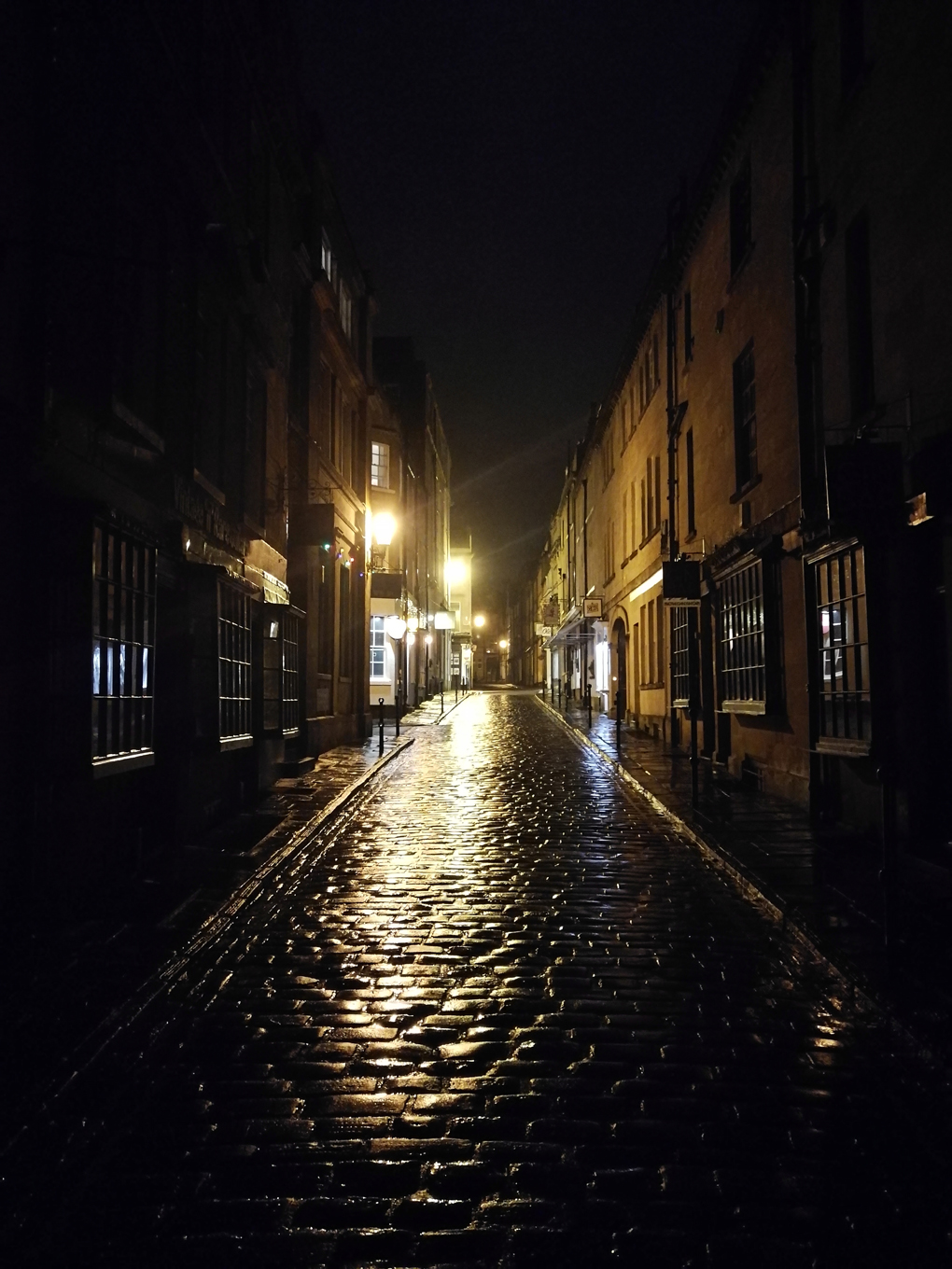 Wet cobbles from a backstreet in Bath