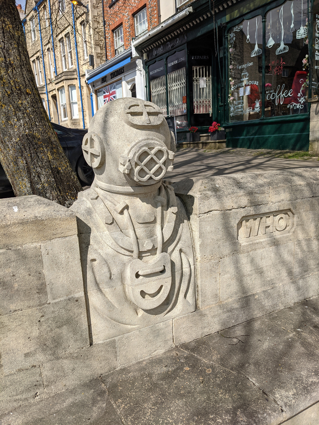 A stone replica of a diver's suit